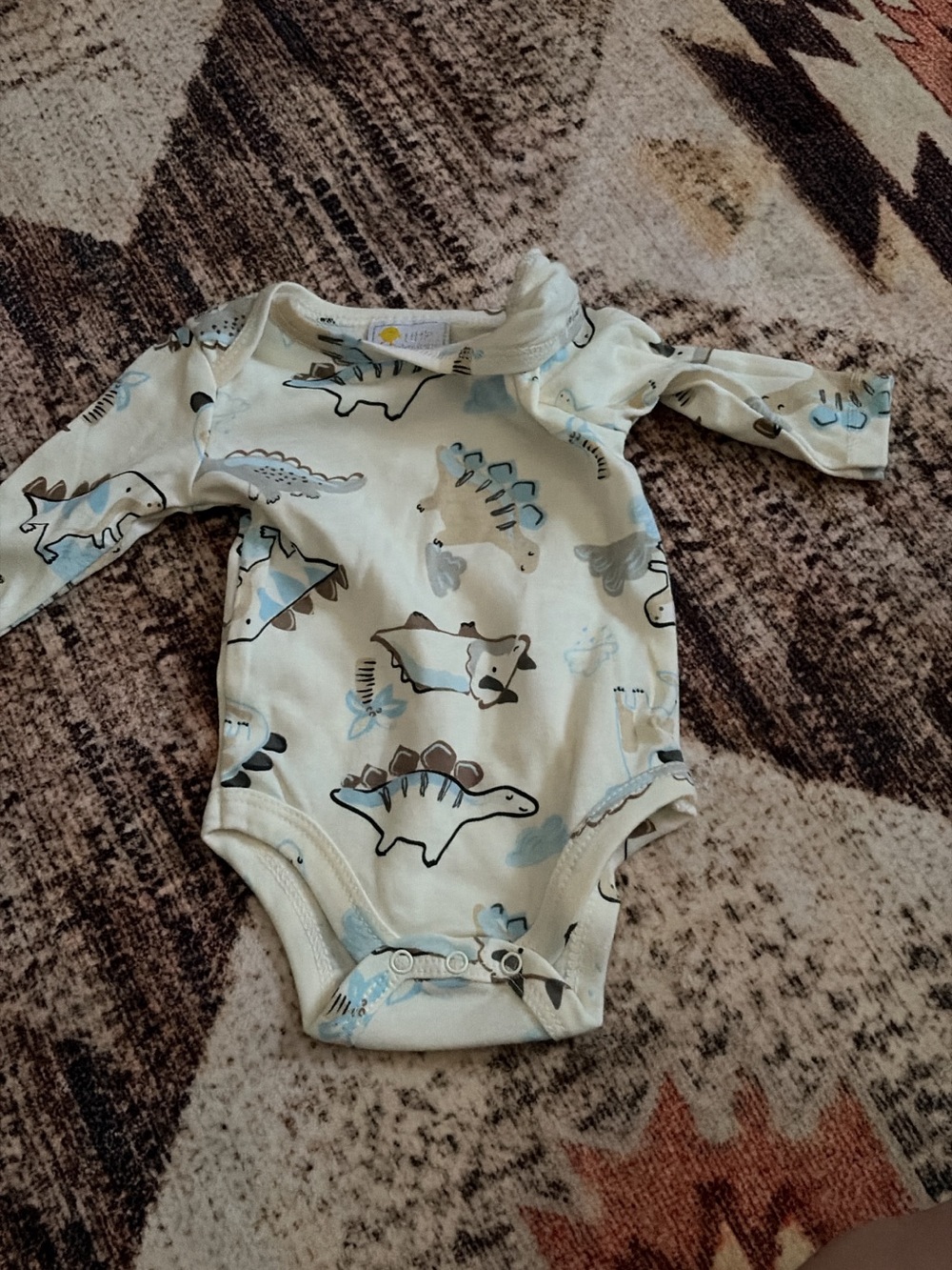 Milly Cream Long-Sleeve Bodysuit with Blue & Brown Dinosaurs